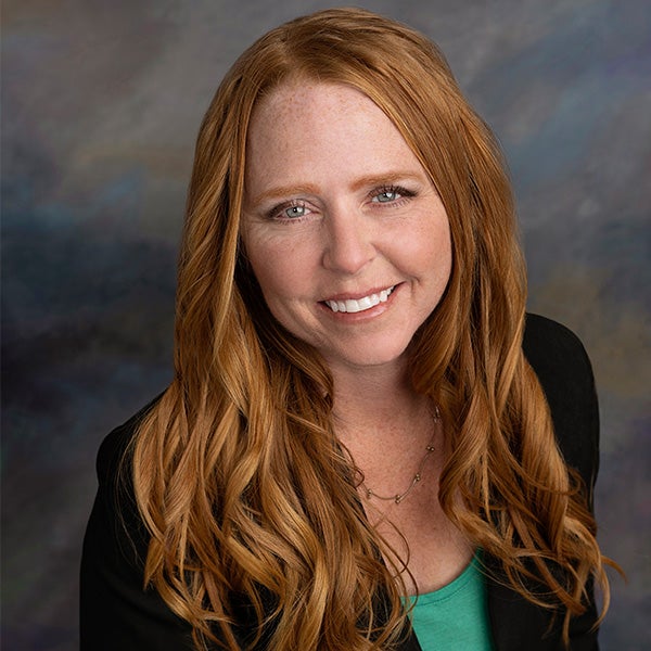 April DeCarsky, a red headed woman